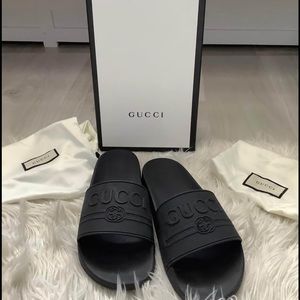 Authentic Gucci rubber slides. Retail $290
